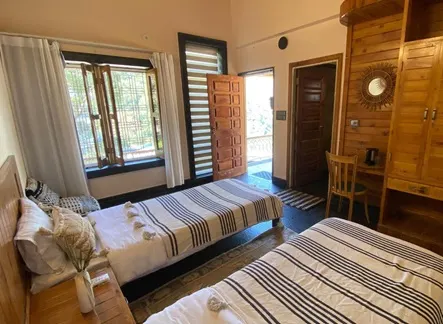 Twin Shared Accommodation for Ashram Stay Clean and peaceful twin shared room for ashram stay with two separate beds