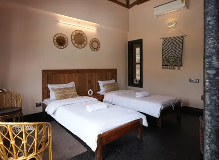 Modern Twin Shared Room with AC and Private Bath - Ideal for Comfortable Stay Air-conditioned twin shared room with two beds and attached bathroom